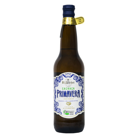 Garrafa de Cachaça Primavera Cabriúva 600ml, envelhecida em barricas de cabriúva, mantendo a receita original da família Weber.